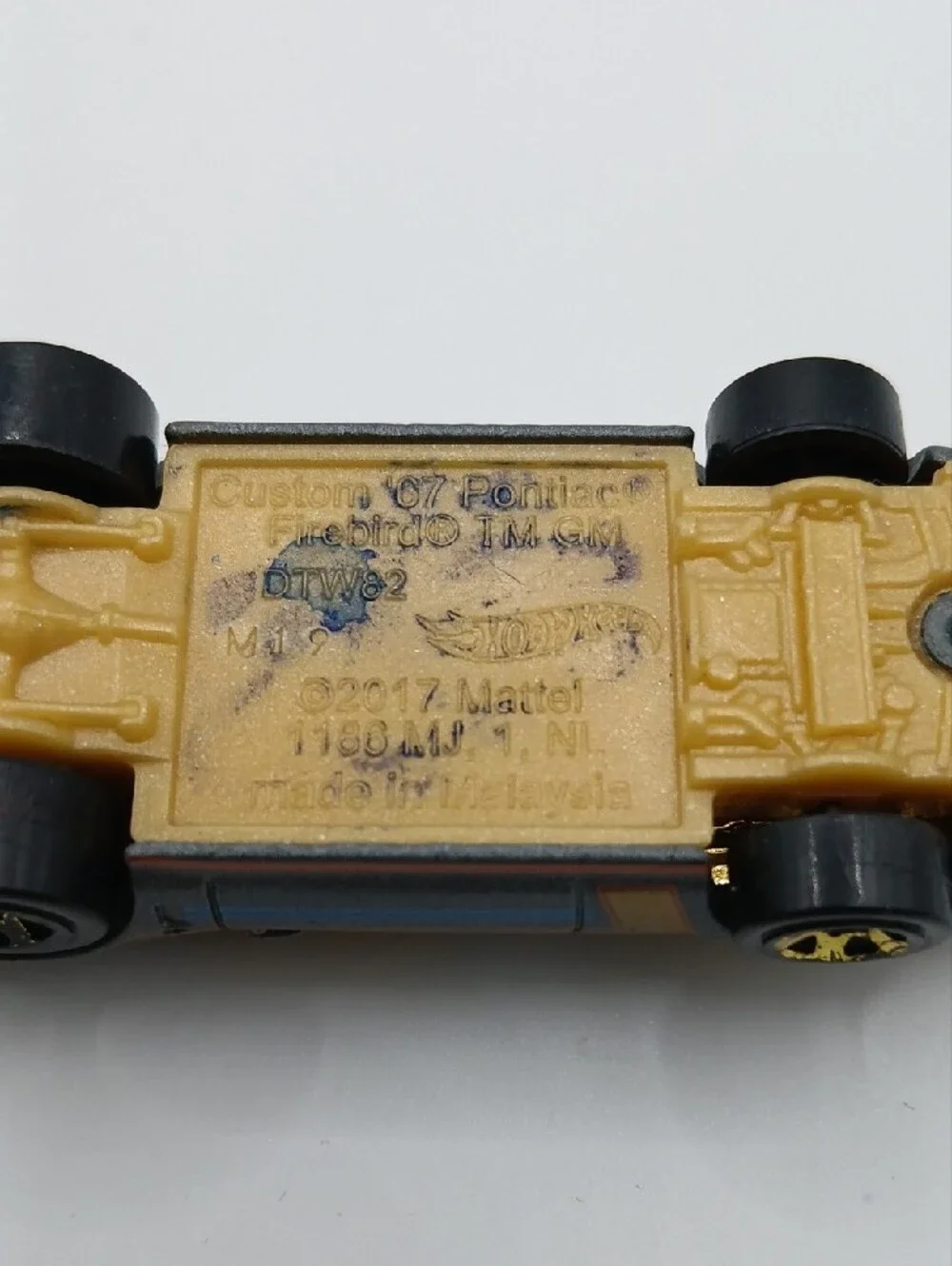 Gray Toy Muscle Car with Gold Engine Detail